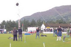 Tossing the Hay Bale